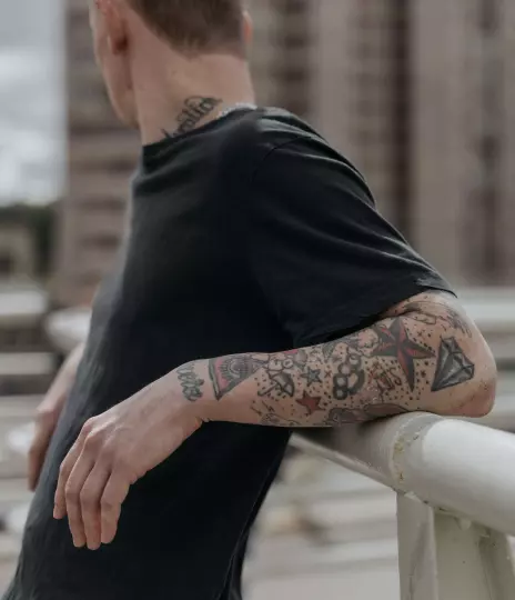 Man with a striking tattoo on his arm