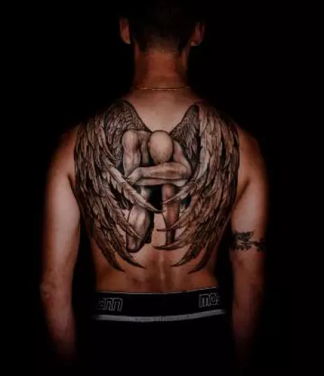 Back tattoo on a man with intricate design